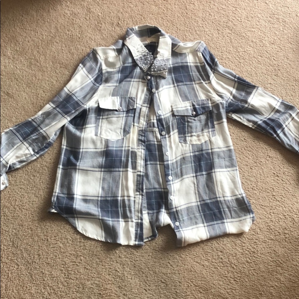 Francesca’s plaid shirt